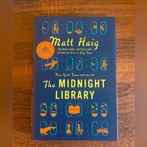 The Midnight Library by Matt Haig, like-new condition!